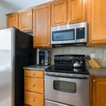 a kitchen with stainless steel appliances